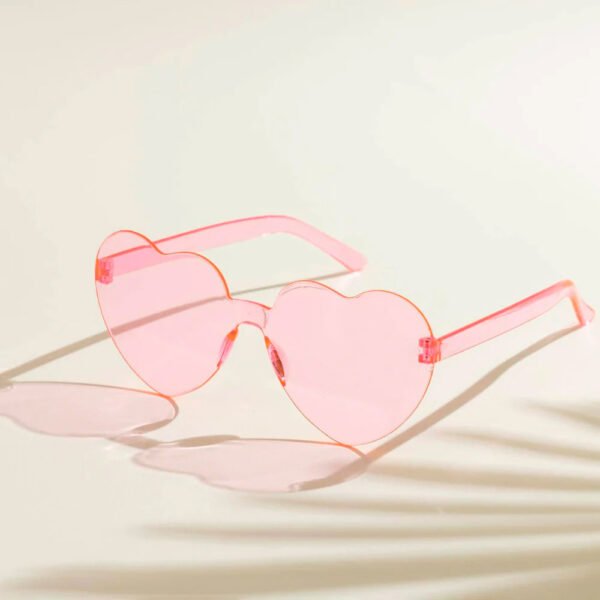 Lentes de corazón rosados transparentes